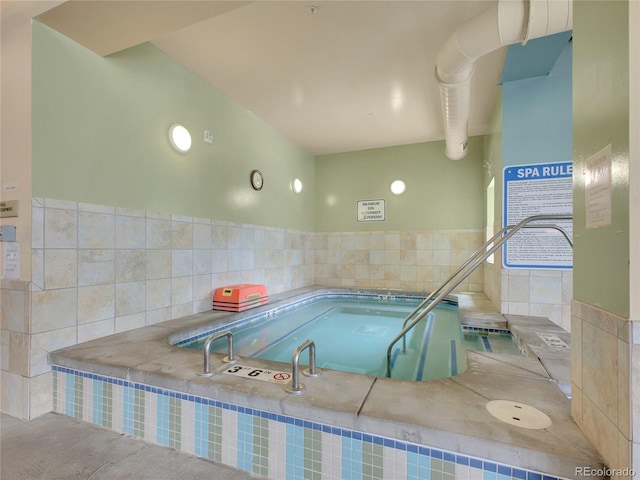 3144 S Wheeling Way Unit 206, Aurora, CO 80014 - view of pool with an in-ground hot tub