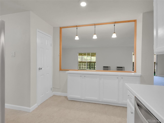 3144 S Wheeling Way Unit 206, Aurora, CO 80014 - kitchen featuring dishwasher, white cabinets, light countertops, and pendant lighting