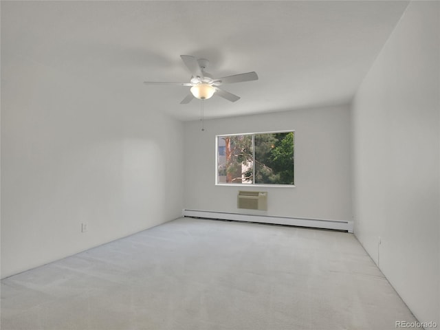 3144 S Wheeling Way Unit 206, Aurora, CO 80014 - unfurnished room featuring a baseboard heating unit, carpet, ceiling fan, and a wall mounted air conditioner