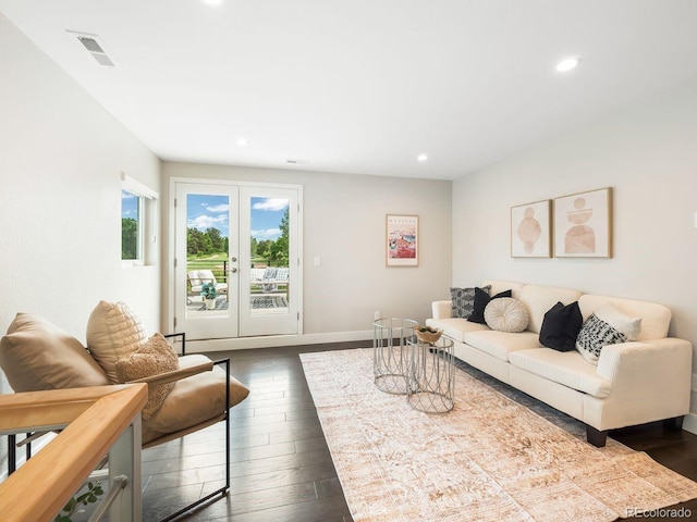 6096 W Keene Ave, Denver, CO 80235 - living area featuring dark wood-style flooring and recessed lighting