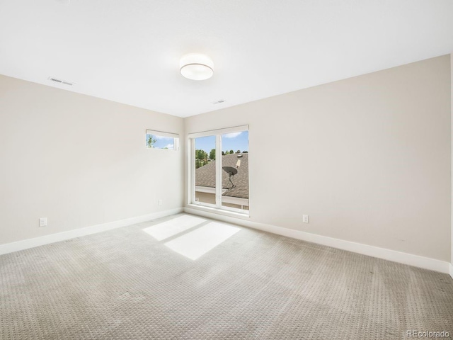 6096 W Keene Ave, Denver, CO 80235 - carpeted spare room featuring baseboards