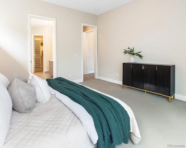 6096 W Keene Ave, Denver, CO 80235 - carpeted bedroom with baseboards