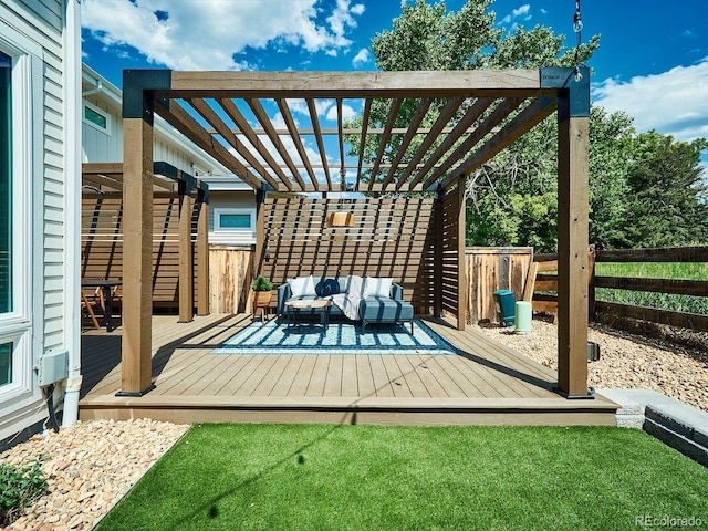 6096 W Keene Ave, Denver, CO 80235 - wooden terrace featuring a pergola, outdoor lounge area, and a fenced backyard