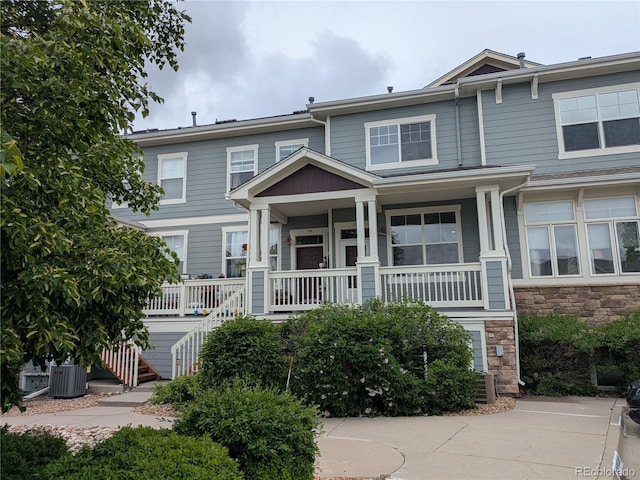 9578 Pearl Cir Unit 105, Parker, CO 80134 - multi unit property with a porch, stone siding, and stairs