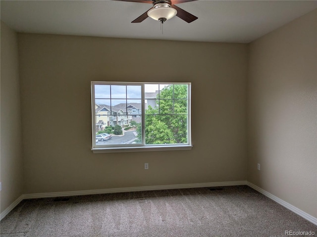 9578 Pearl Cir Unit 105, Parker, CO 80134 - unfurnished room featuring carpet, ceiling fan, and baseboards