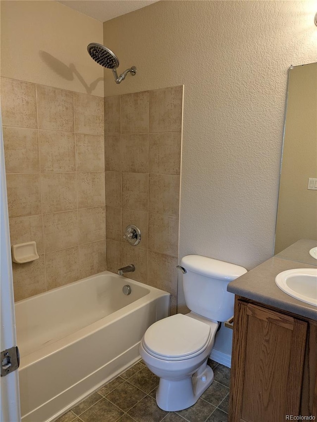 9578 Pearl Cir Unit 105, Parker, CO 80134 - full bathroom featuring vanity, toilet, shower / washtub combination, and tile patterned floors