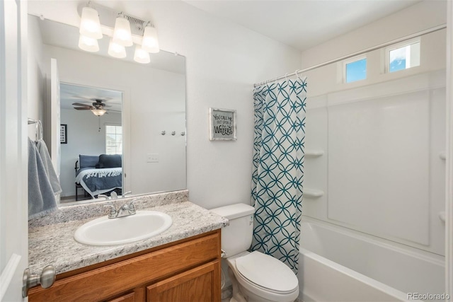 bathroom featuring ensuite bathroom, vanity, toilet, and plenty of natural light
