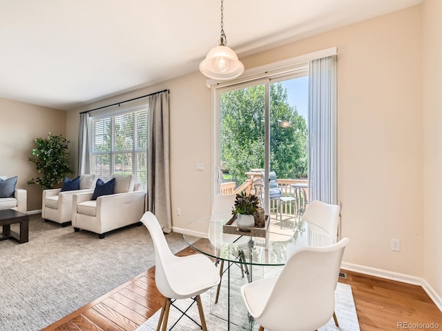 4561 Hope Cir, Broomfield, CO 80023 - dining area featuring wood finished floors and baseboards