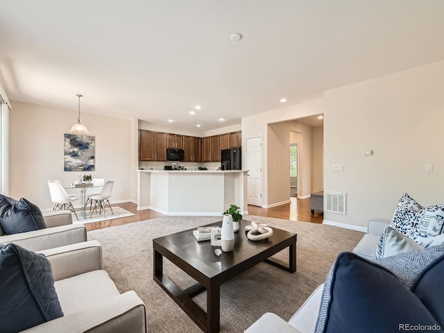 4561 Hope Cir, Broomfield, CO 80023 - living area featuring recessed lighting and light wood-style flooring