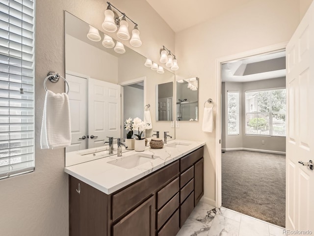 4561 Hope Cir, Broomfield, CO 80023 - bathroom featuring double vanity and marble finish floors