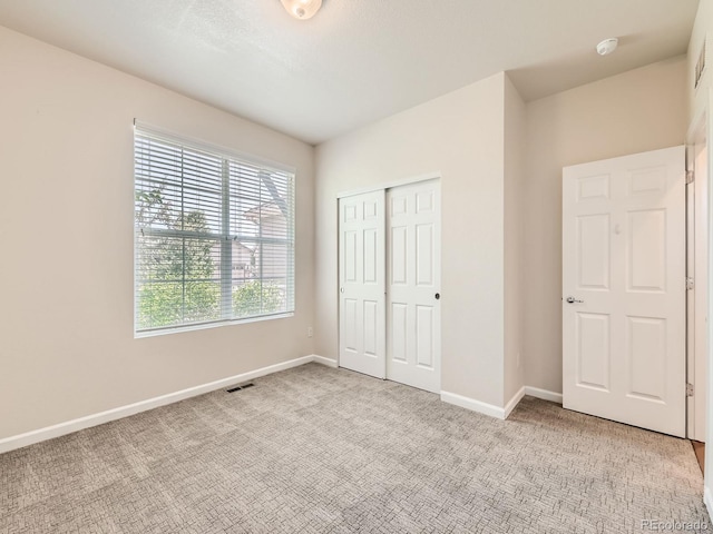 4561 Hope Cir, Broomfield, CO 80023 - unfurnished bedroom featuring light colored carpet and a closet