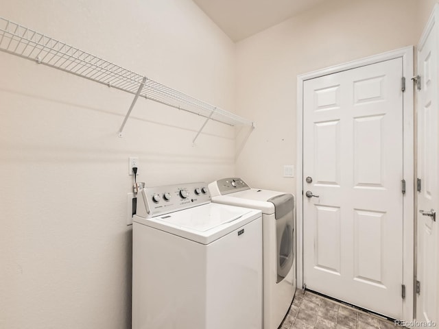 4561 Hope Cir, Broomfield, CO 80023 - laundry area with washer and clothes dryer