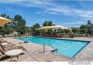 4561 Hope Cir, Broomfield, CO 80023 - community pool with a patio area