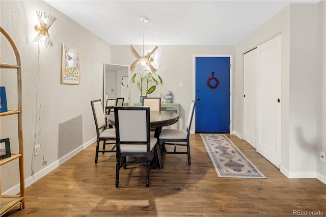 dining area featuring hardwood / wood-style flooring