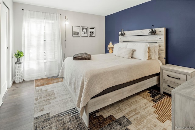 bedroom featuring wood-type flooring