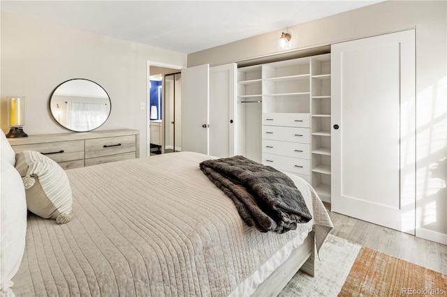 bedroom featuring light wood-type flooring