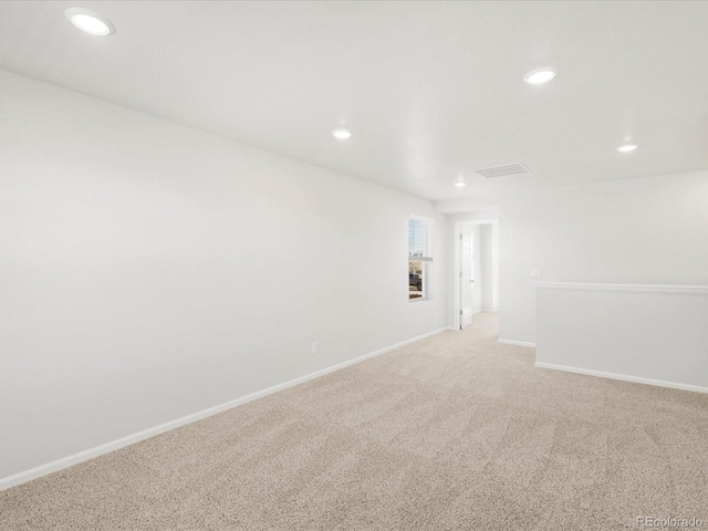 8850 Sedalia St, Commerce City, CO 80022 - spare room with recessed lighting, light carpet, and baseboards