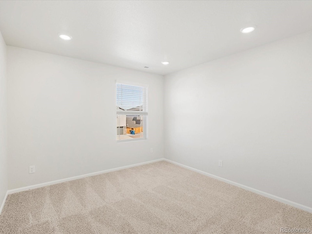 8850 Sedalia St, Commerce City, CO 80022 - carpeted spare room featuring recessed lighting and baseboards