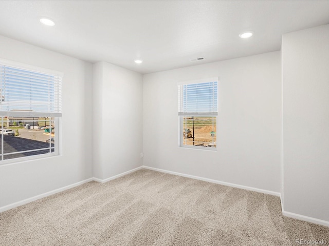 8850 Sedalia St, Commerce City, CO 80022 - unfurnished room featuring carpet, baseboards, and recessed lighting