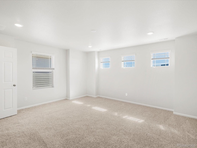 8850 Sedalia St, Commerce City, CO 80022 - empty room featuring carpet floors, healthy amount of natural light, baseboards, and recessed lighting
