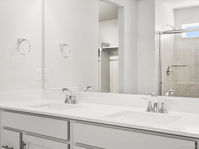 8850 Sedalia St, Commerce City, CO 80022 - bathroom with double vanity and a tile shower