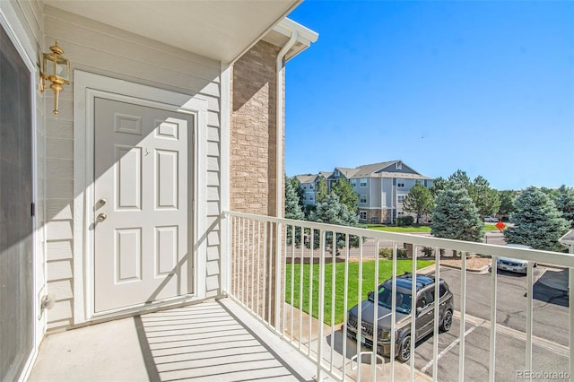 balcony featuring a residential view