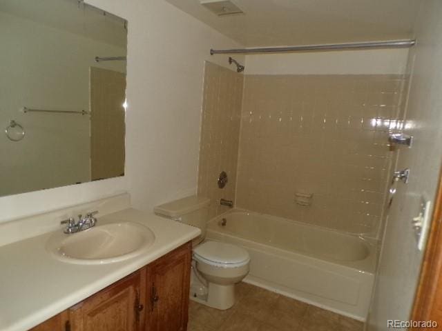 full bathroom with bathtub / shower combination, vanity, toilet, and tile patterned floors