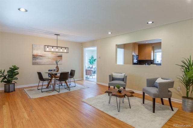 3098 S Vine St, Denver, CO 80210 - dining space with light wood-type flooring, baseboards, and recessed lighting