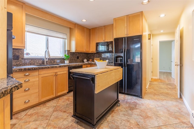 3098 S Vine St, Denver, CO 80210 - kitchen with black appliances, a sink, butcher block counters, backsplash, and recessed lighting