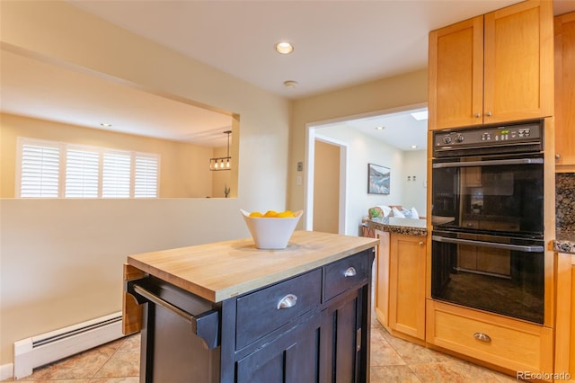 3098 S Vine St, Denver, CO 80210 - kitchen with a baseboard radiator, recessed lighting, light tile patterned flooring, butcher block countertops, and a center island