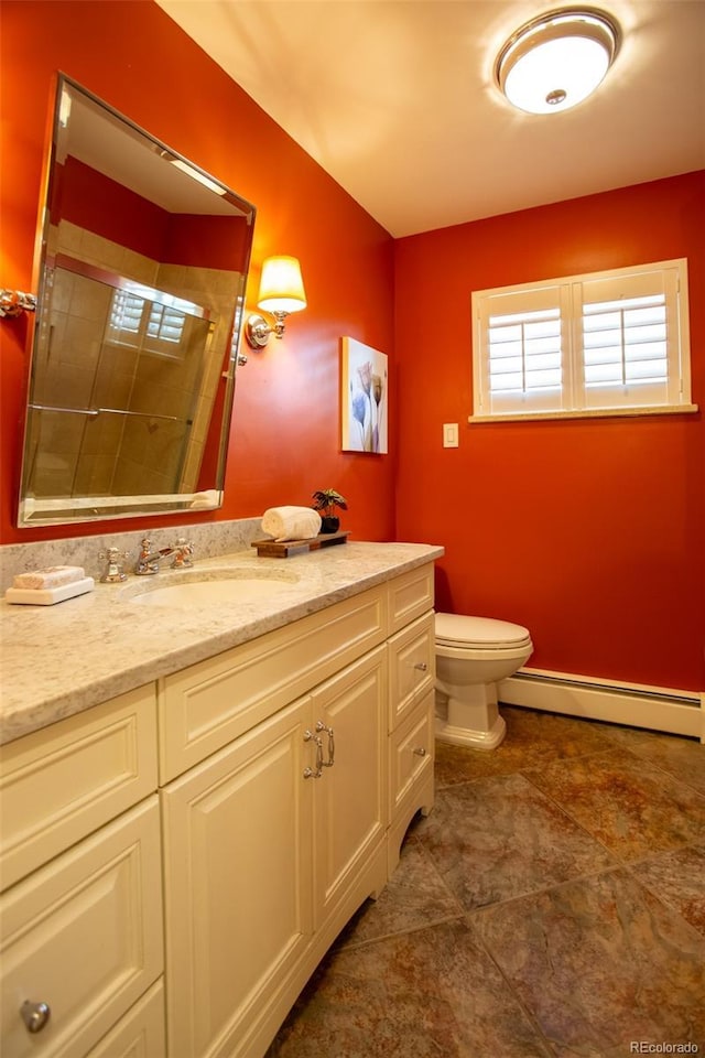 3098 S Vine St, Denver, CO 80210 - full bath with a baseboard heating unit, a tile shower, vanity, toilet, and tile patterned flooring