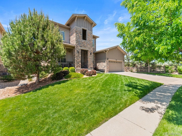13645 Osage Ct, Broomfield, CO 80023 - view of front of home featuring stone siding, board and batten siding, a front yard, a garage, and concrete driveway