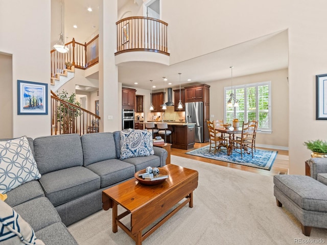 13645 Osage Ct, Broomfield, CO 80023 - living room with stairway, recessed lighting, and a high ceiling
