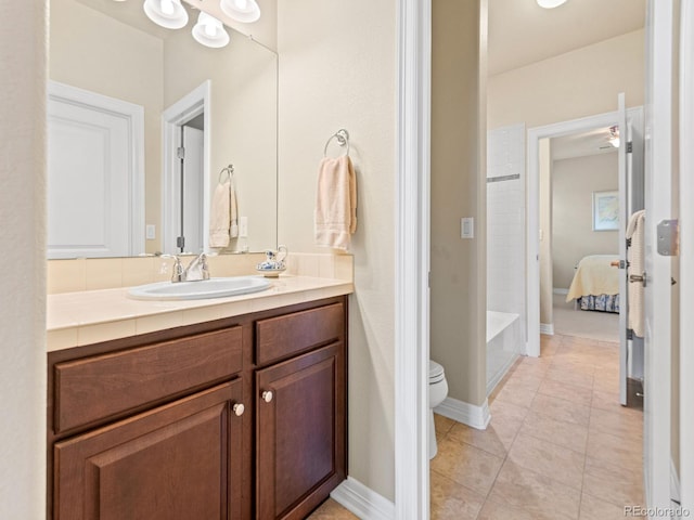 13645 Osage Ct, Broomfield, CO 80023 - ensuite bathroom with vanity and tile patterned floors