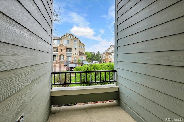balcony featuring a residential view
