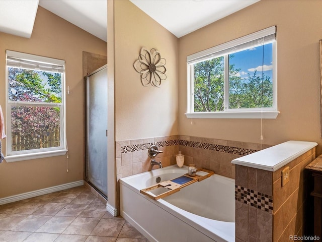 885 Sage Sparrow Cir, Highlands Ranch, CO 80129 - bathroom featuring a garden tub, a shower stall, and tile patterned flooring