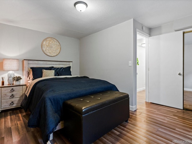 885 Sage Sparrow Cir, Highlands Ranch, CO 80129 - bedroom featuring wood finished floors and baseboards