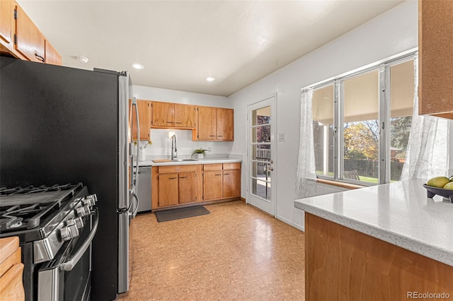 kitchen with sink and stainless steel appliances