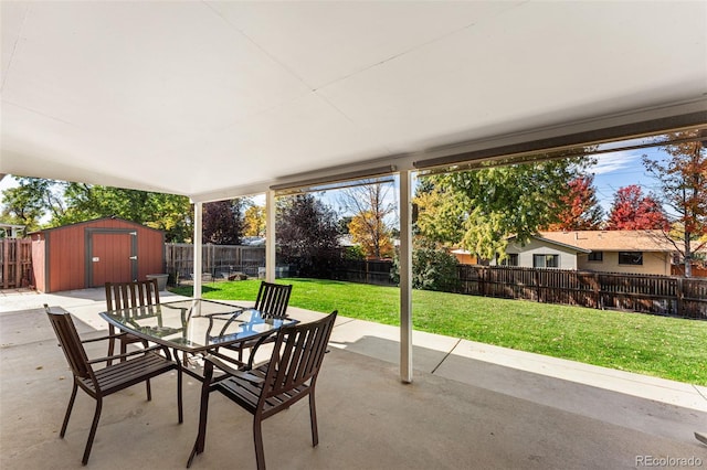 view of patio / terrace with a storage shed