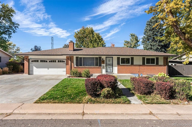 single story home featuring a garage