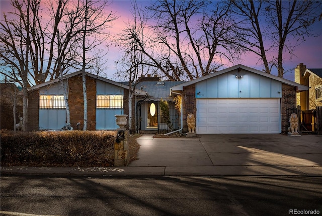 single story home with a garage