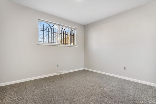 empty room featuring carpet floors