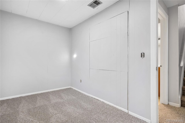 empty room featuring carpet floors