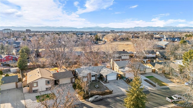 birds eye view of property with a mountain view