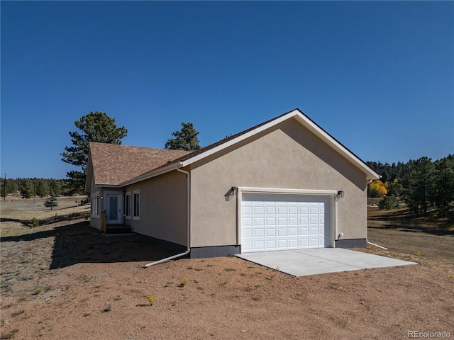 view of home's exterior with a garage