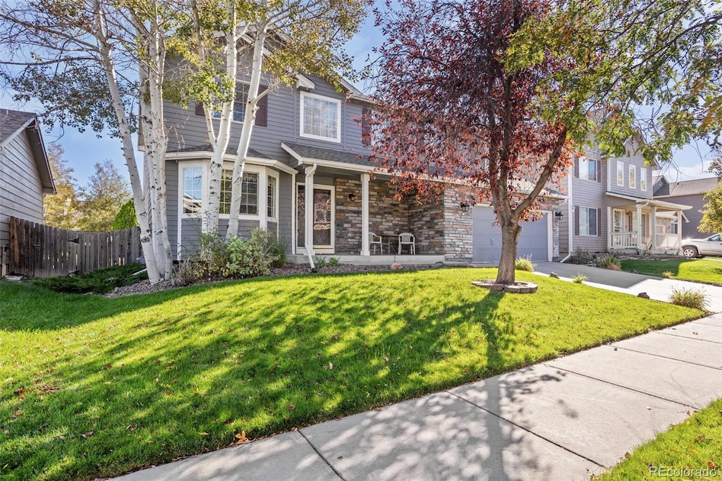 front facade with a front lawn