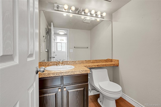 3163 E 133rd Ave, Thornton, CO 80241 - bathroom with vanity and wood finished floors