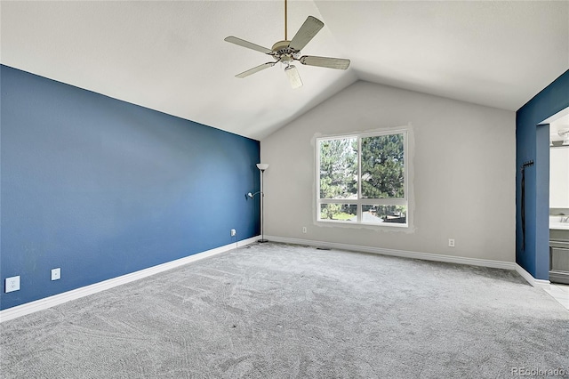 3163 E 133rd Ave, Thornton, CO 80241 - empty room with ceiling fan, carpet floors, and vaulted ceiling