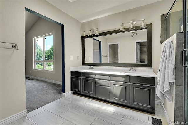 3163 E 133rd Ave, Thornton, CO 80241 - full bathroom with double vanity and a shower with door