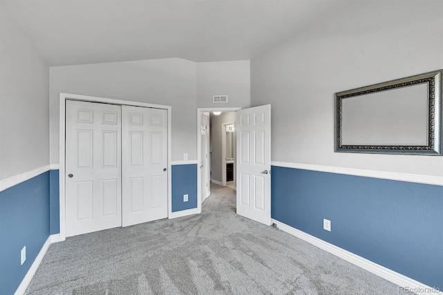 3163 E 133rd Ave, Thornton, CO 80241 - unfurnished bedroom featuring lofted ceiling, carpet floors, and a closet